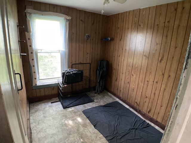 207 W Williams St, Dwight, IL 60420 - workout area featuring wooden walls, healthy amount of natural light, and ceiling fan