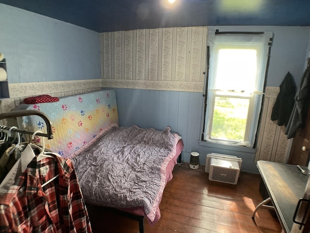 207 W Williams St, Dwight, IL 60420 - bedroom featuring wood-type flooring and wainscoting