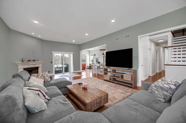 0N745 Bartelt Rd, Geneva, IL 60134 - living area with wood finished floors, recessed lighting, a fireplace, and baseboards