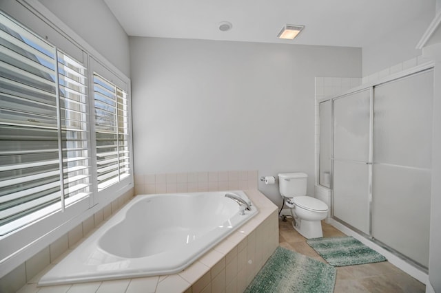 0N745 Bartelt Rd, Geneva, IL 60134 - bathroom with toilet, a garden tub, a shower stall, and tile patterned floors