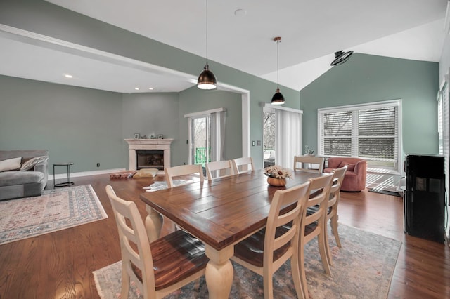 0N745 Bartelt Rd, Geneva, IL 60134 - dining room with wood finished floors, vaulted ceiling, a fireplace, and recessed lighting