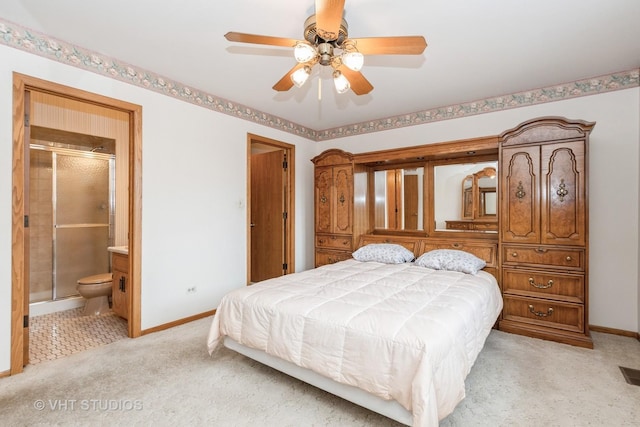 15309 S 73rd Ave Unit 15309, Orland Park, IL 60462 - bedroom with baseboards, light colored carpet, ensuite bathroom, and ceiling fan