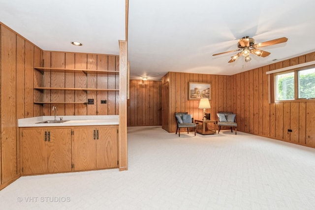 15309 S 73rd Ave Unit 15309, Orland Park, IL 60462 - sitting room with wooden walls, ceiling fan, and light colored carpet