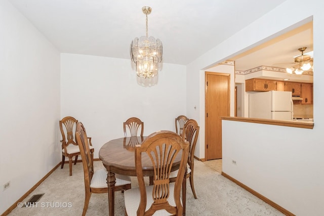 15309 S 73rd Ave Unit 15309, Orland Park, IL 60462 - dining space with a chandelier, baseboards, light carpet, and a ceiling fan