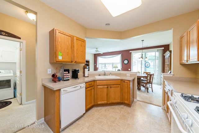 2507 Rolling Rdg, Elgin, IL 60124 - kitchen with white appliances, a sink, washer / clothes dryer, and light countertops