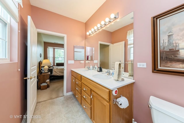 2507 Rolling Rdg, Elgin, IL 60124 - bathroom with toilet, double vanity, ensuite bath, and tile patterned flooring