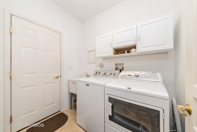 2507 Rolling Rdg, Elgin, IL 60124 - washroom with washer and dryer, cabinet space, light tile patterned floors, and baseboards