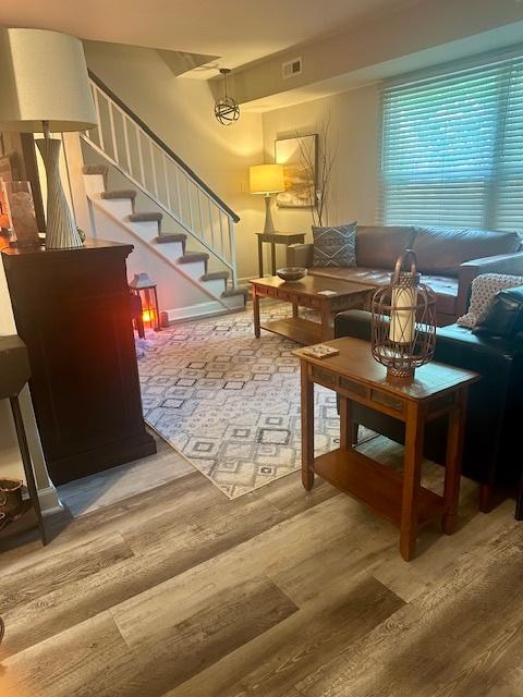 1381 N Glen Cir Unit D, Aurora, IL 60506 - living room with wood finished floors and stairs