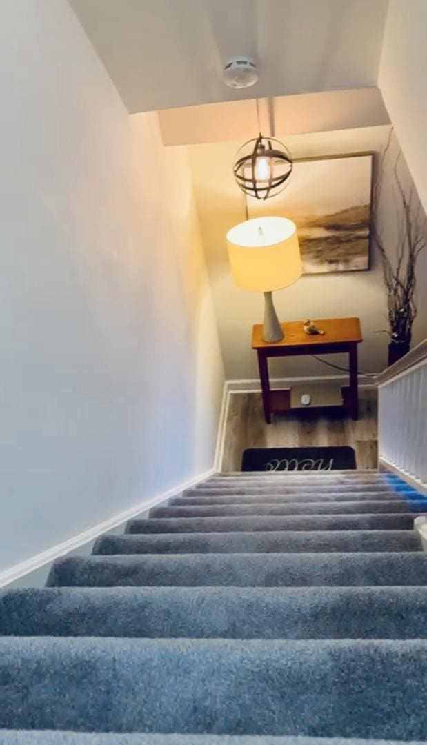 1381 N Glen Cir Unit D, Aurora, IL 60506 - staircase featuring baseboards