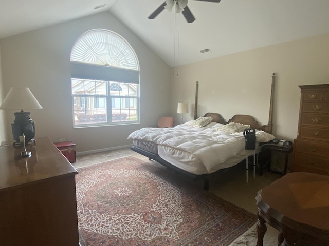 2018 Olmstead Dr Unit 2018, Woodstock, IL 60098 - carpeted bedroom with vaulted ceiling, multiple windows, and a ceiling fan
