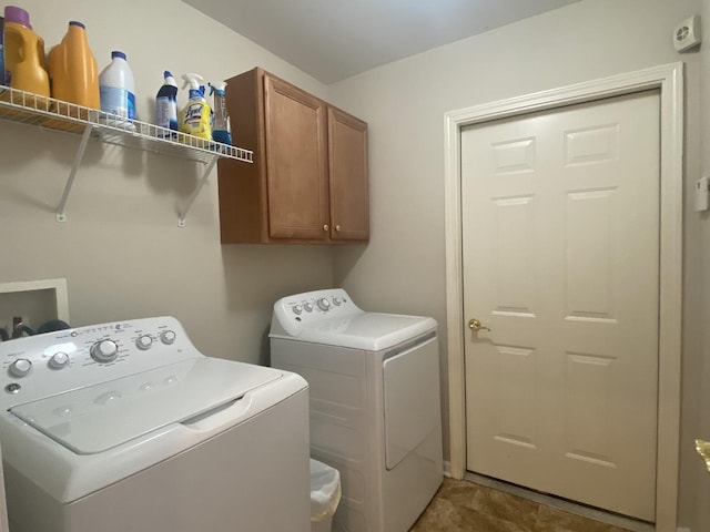 2018 Olmstead Dr Unit 2018, Woodstock, IL 60098 - washroom with washing machine and clothes dryer and cabinet space