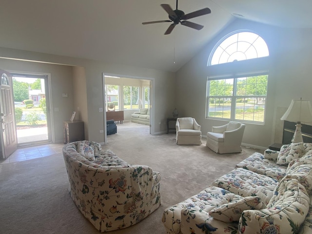 2018 Olmstead Dr Unit 2018, Woodstock, IL 60098 - living room featuring carpet floors, healthy amount of natural light, a ceiling fan, and high vaulted ceiling