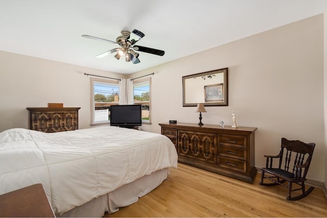 4522 N Reserve Ave, Chicago, IL 60656 - bedroom featuring light wood-type flooring and a ceiling fan