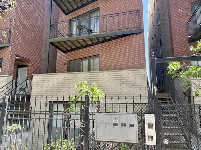 25 E 26th St Unit 2, Chicago, IL 60616 - view of side of property featuring brick siding