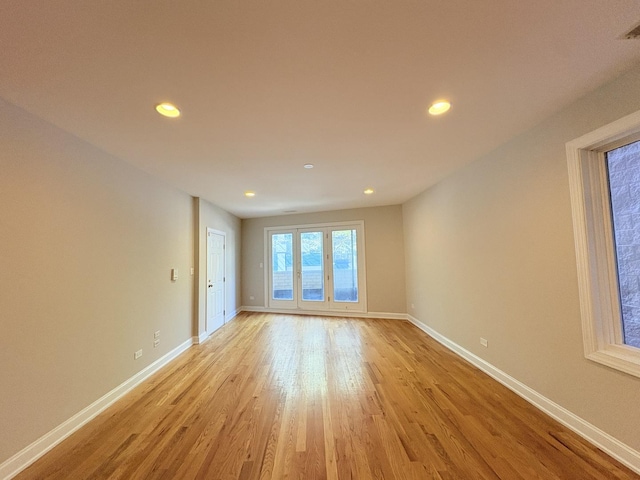 25 E 26th St Unit 2, Chicago, IL 60616 - unfurnished room with light wood-type flooring, baseboards, and recessed lighting
