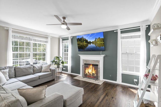 3174 Larrabee Dr, Geneva, IL 60134 - living area featuring ornamental molding, a fireplace with flush hearth, wood finished floors, ceiling fan, and baseboards