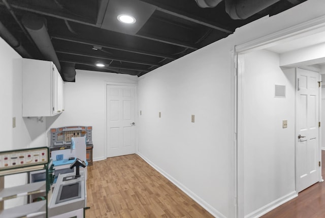 3174 Larrabee Dr, Geneva, IL 60134 - finished basement featuring light wood-style floors and baseboards