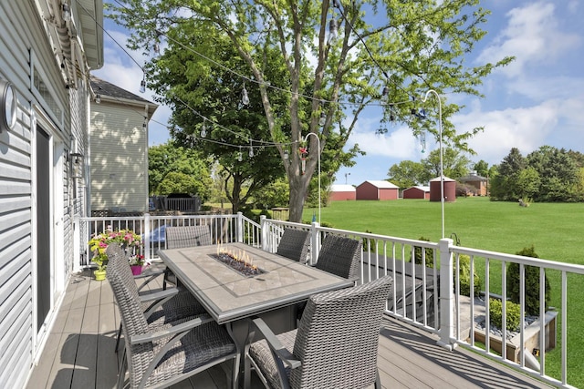 3174 Larrabee Dr, Geneva, IL 60134 - wooden terrace with a yard, outdoor dining area, and an outdoor fire pit