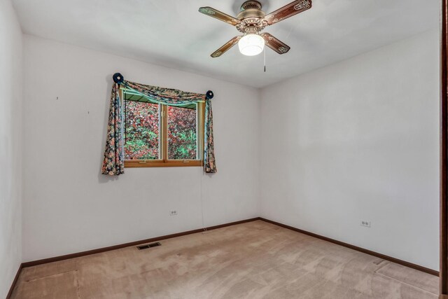 10762 W Talmadge Ave, Beach Park, IL 60099 - unfurnished room with ceiling fan, baseboards, and light carpet