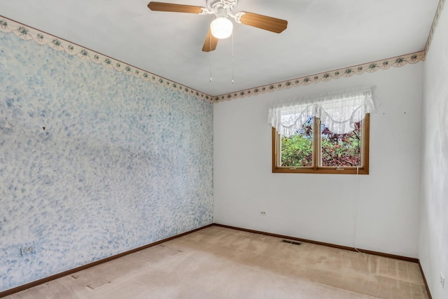 10762 W Talmadge Ave, Beach Park, IL 60099 - spare room featuring carpet, baseboards, and ceiling fan