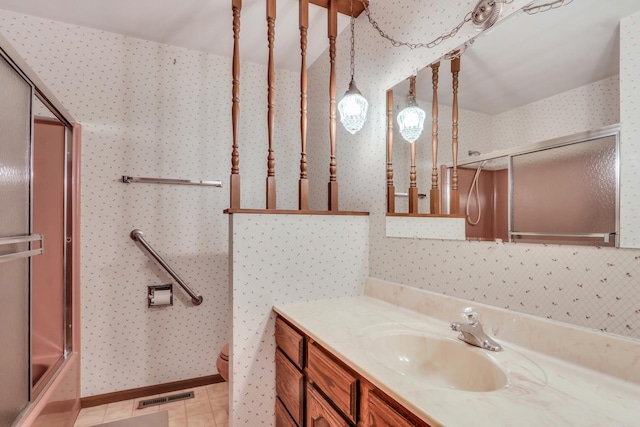 10762 W Talmadge Ave, Beach Park, IL 60099 - bathroom with vanity, wallpapered walls, toilet, and combined bath / shower with glass door