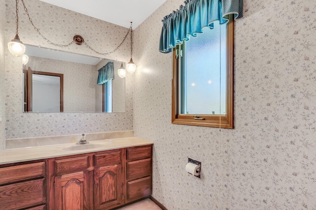 10762 W Talmadge Ave, Beach Park, IL 60099 - bathroom featuring wallpapered walls and vanity
