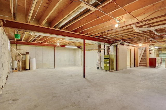 10762 W Talmadge Ave, Beach Park, IL 60099 - unfinished basement with stairs, a water softener system, and heating unit
