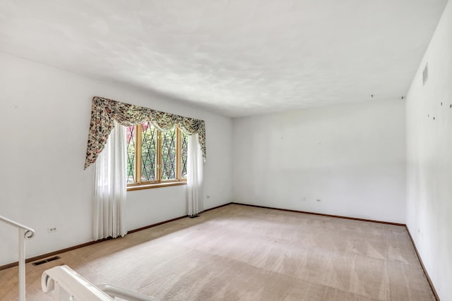 10762 W Talmadge Ave, Beach Park, IL 60099 - unfurnished room featuring light colored carpet and baseboards