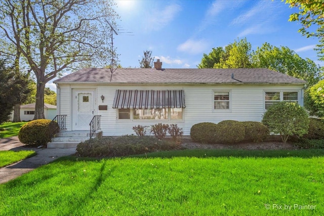 1029 S 5th St, Saint Charles, IL 60174 - view of front of property featuring a chimney and a front lawn