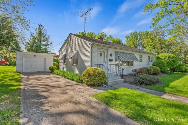 1029 S 5th St, Saint Charles, IL 60174 - view of front of home featuring a chimney, an outdoor structure, concrete driveway, a front yard, and a garage