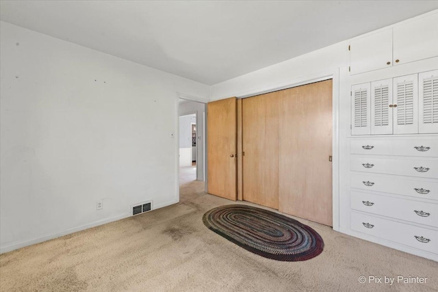 1029 S 5th St, Saint Charles, IL 60174 - unfurnished bedroom featuring light colored carpet, a closet, and baseboards