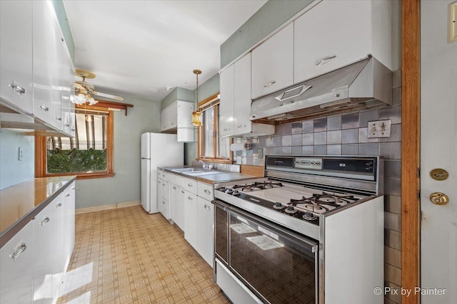 1029 S 5th St, Saint Charles, IL 60174 - kitchen featuring white appliances, under cabinet range hood, white cabinets, light flooring, and decorative backsplash