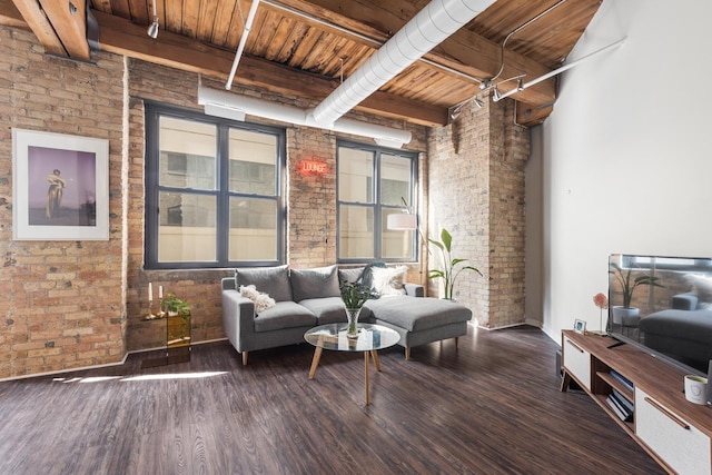 225 W Huron St Unit 402, Chicago, IL 60654 - living room featuring brick wall, wood ceiling, wood finished floors, and beam ceiling