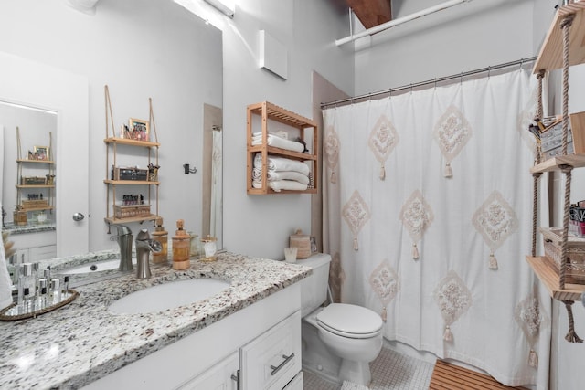 225 W Huron St Unit 402, Chicago, IL 60654 - full bathroom with tile patterned flooring, toilet, vanity, and curtained shower