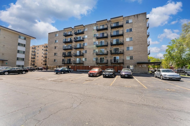 310 Lathrop Ave Unit 202-204, Forest Park, IL 60130 - view of apartment building / complex featuring uncovered parking