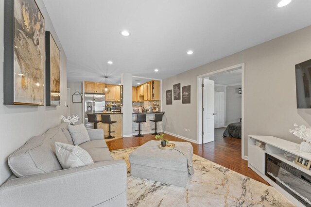 310 Lathrop Ave Unit 202-204, Forest Park, IL 60130 - living room with dark wood-type flooring, recessed lighting, and baseboards
