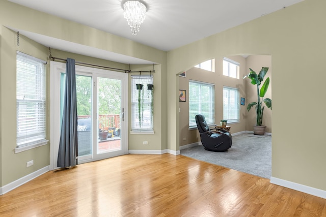1984 Seaview Dr, Aurora, IL 60503 - foyer entrance with a chandelier, baseboards, and wood finished floors