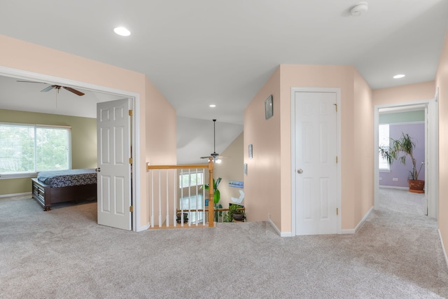 1984 Seaview Dr, Aurora, IL 60503 - corridor with carpet floors, baseboards, recessed lighting, and vaulted ceiling