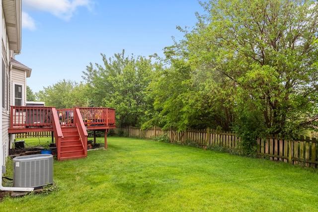 1984 Seaview Dr, Aurora, IL 60503 - view of yard with cooling unit, a wooden deck, and stairway