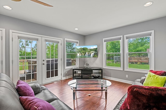 28271 W Stewart Ave, Spring Grove, IL 60081 - living area featuring french doors, healthy amount of natural light, baseboards, wood finished floors, and recessed lighting