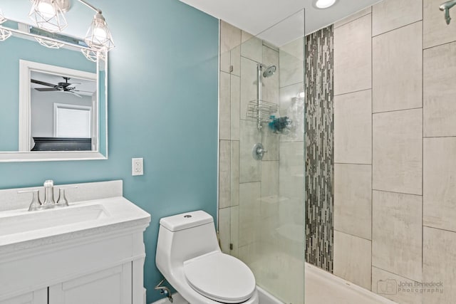 28271 W Stewart Ave, Spring Grove, IL 60081 - bathroom featuring a shower stall, toilet, vanity, and a ceiling fan