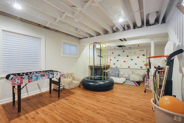 playroom featuring wood finished floors