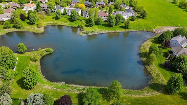 aerial view of residential area with a nearby body of water