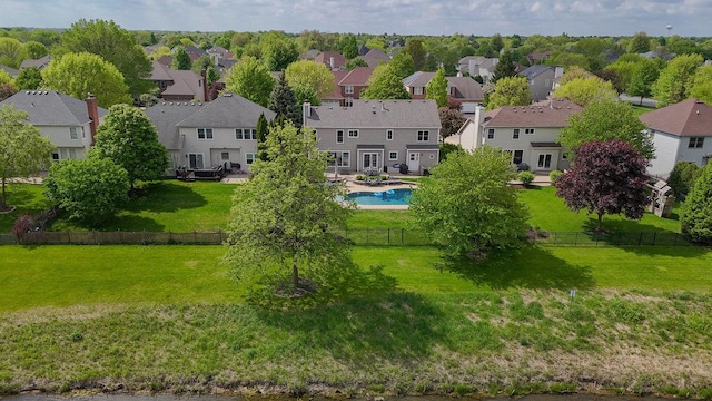 aerial view of residential area with a pool