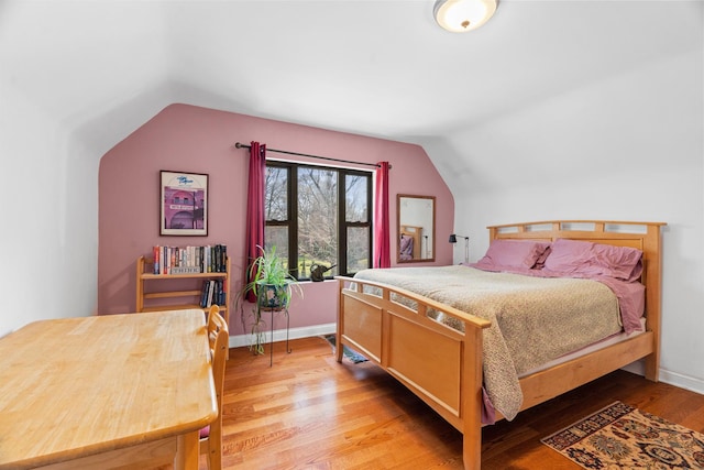 6914 S Cregier Ave, Chicago, IL 60649 - bedroom featuring lofted ceiling and light wood-style flooring