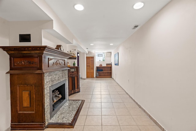 6914 S Cregier Ave, Chicago, IL 60649 - living area featuring light tile patterned floors, a high end fireplace, and recessed lighting