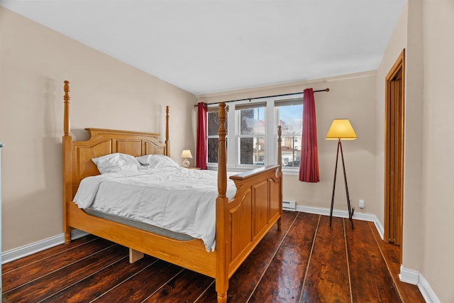 6914 S Cregier Ave, Chicago, IL 60649 - bedroom with dark wood-style flooring, a baseboard radiator, and baseboards