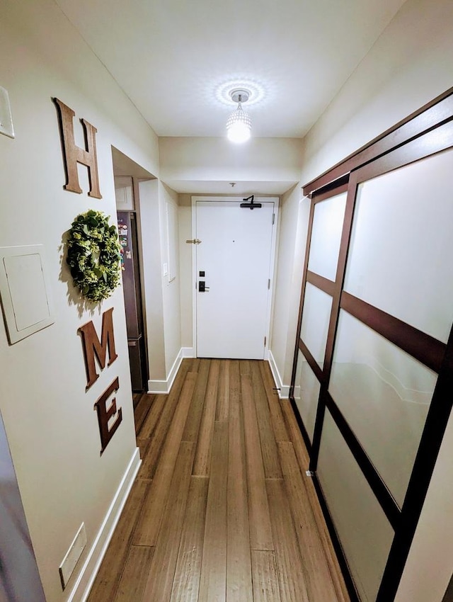 465 W Dominion Dr Unit 1304, Wood Dale, IL 60191 - corridor featuring wood finished floors and baseboards