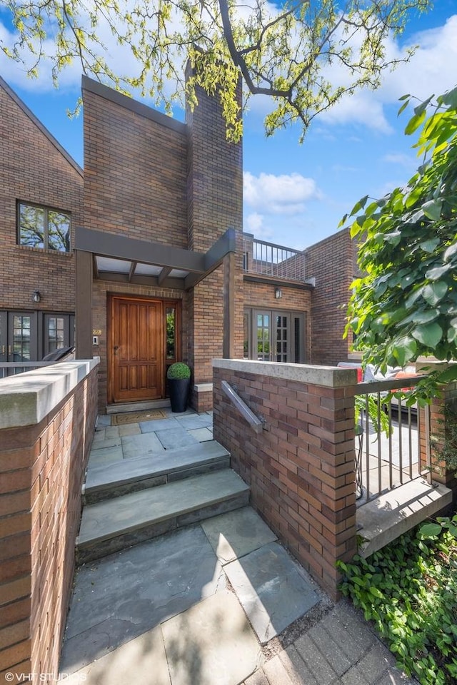 509 Burr Oak Pl, Hinsdale, IL 60521 - property entrance featuring brick siding and a chimney