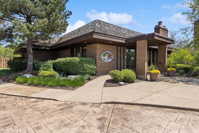 509 Burr Oak Pl, Hinsdale, IL 60521 - view of front of house featuring brick siding and a chimney